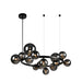 Modern multi-light chandelier with a matte black circular ring and multiple smoked glass globes, suspended from a black ceiling canopy against a white background.